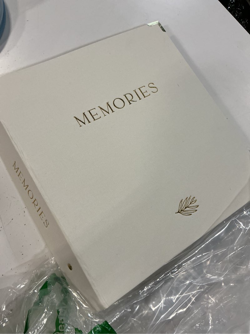 Condition photo showing Good Condition for (memories) | luxury linen bound video book | gold foil stamping | up to 3 hours of video, 7” ips display, 4gb of memory & rechargeable battery