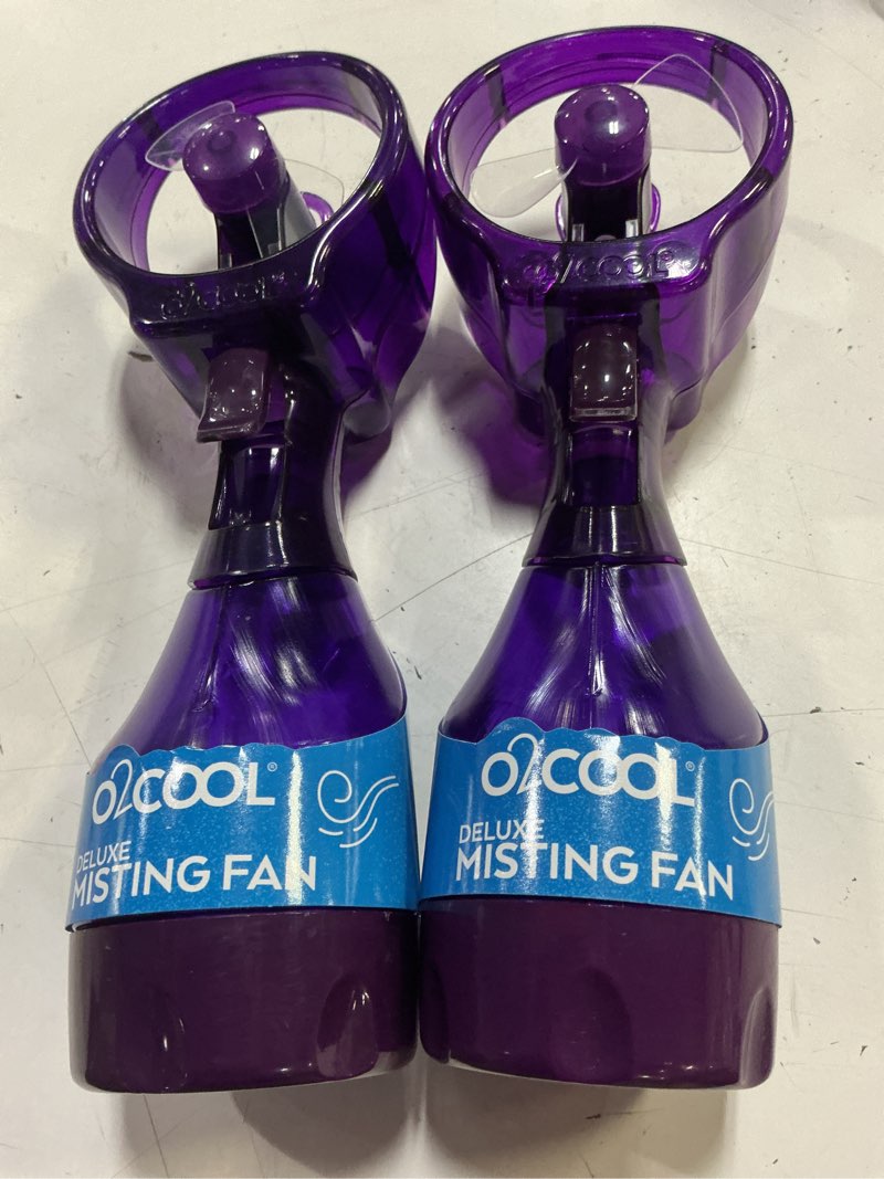 Condition photo showing Good Condition for o2cool deluxe handheld battery powered water misting fan (purple) 2 pack purple 2 pack