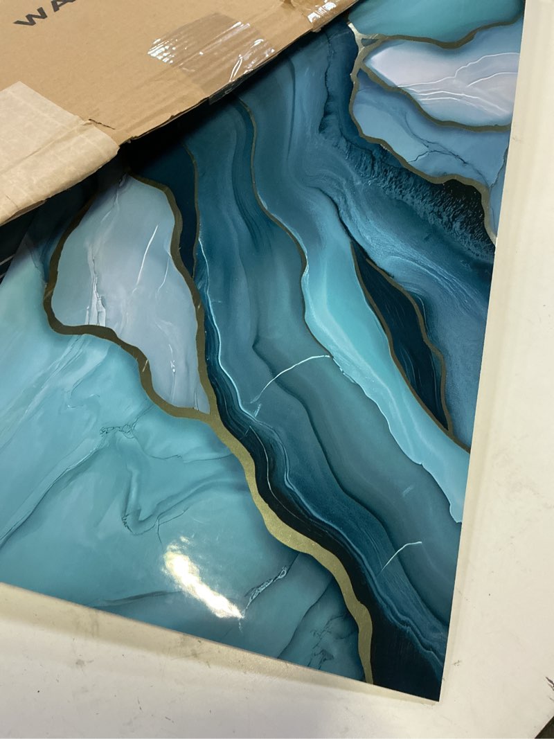 Condition photo showing Good Condition for chejiaye 10pcs marble peel and stick waterproof wall panels,heat-resistant backsplash tile, 23.6"x11.8" pvc foam wall sticker for kitchen,living rooms,tv walls,blue wave (not real tile 19.4sq. ft.) blue wave 23.6" x 11.8" x 2.5mm x 10pack