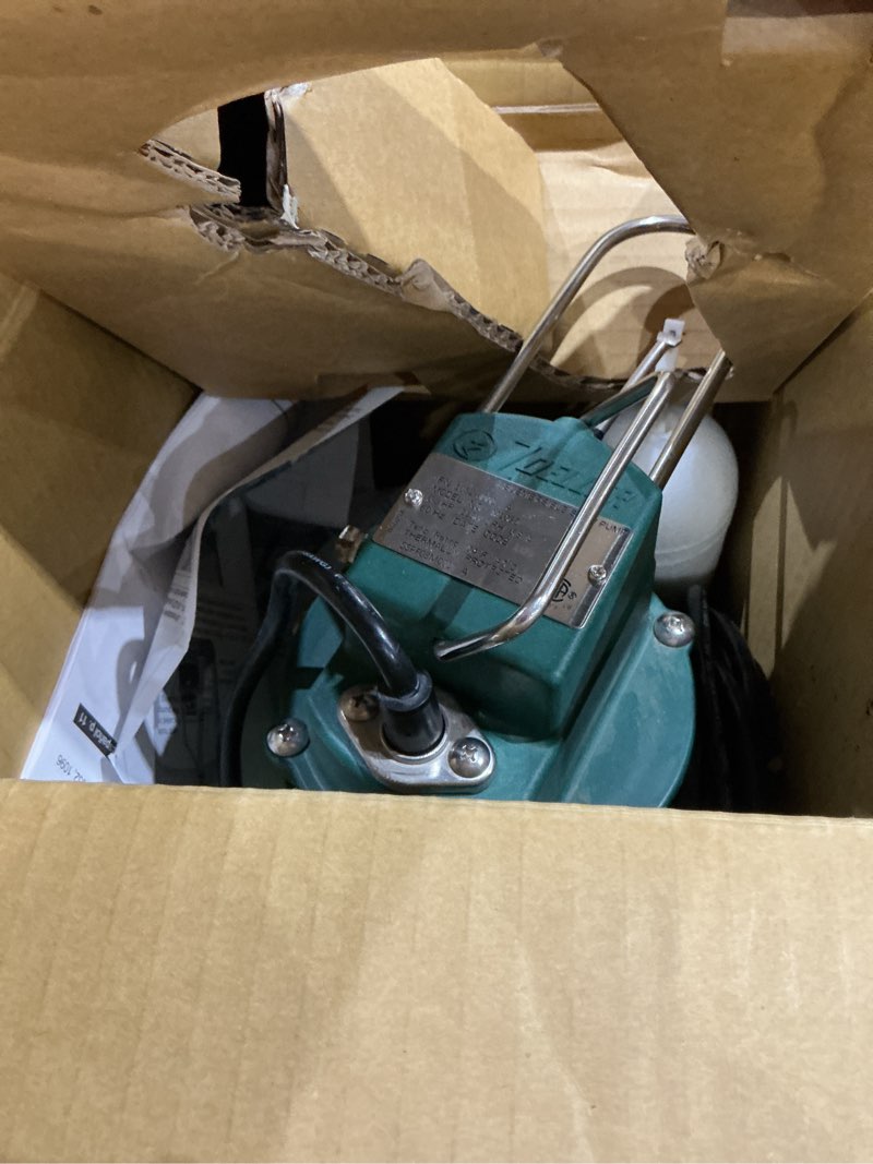 Condition photo showing As Is for zoeller 1/3 hp 2880 gph cast iron vertical float switch ac submersible sump pump
