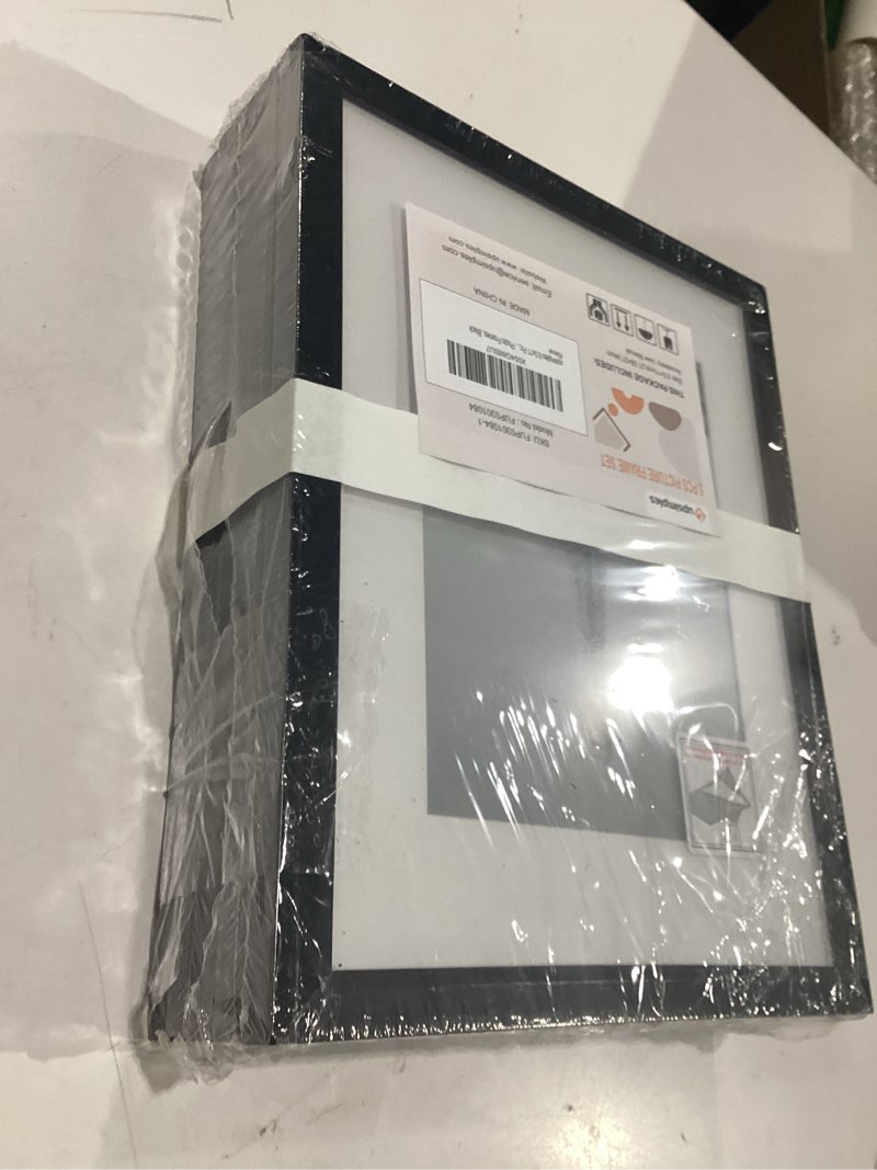 Condition photo showing New/Like New for upsimples 8.5x11 picture frame set of 5, display pictures 6x8 with mat or 8.5 by 11 without, wall gallery photo frames, black black 8.5x11