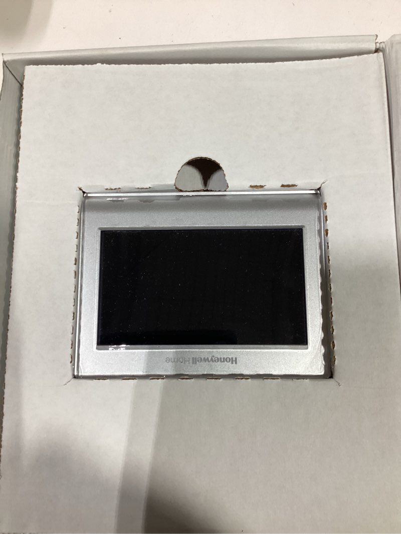 Condition photo showing As Is for honeywell home silver smart compatible thermostat