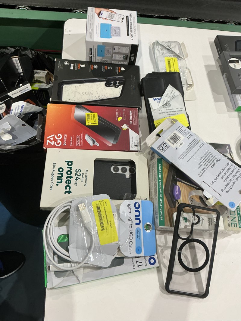 Condition photo showing As Is for assorted cellphone/tablet/laptop case covers & accessories