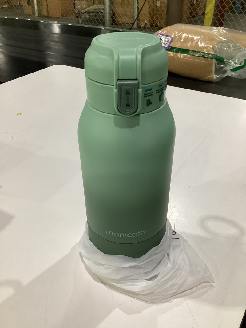 Condition photo showing Good Condition for Momcozy Portable Milk Warmer for Travel – Dual Heating Modes for Breast Milk & Water, Portable Bottle Warmer with Fast Heating & Long Battery Life, 17 Ounces Large Capacity to Meet Your All-Day Needs