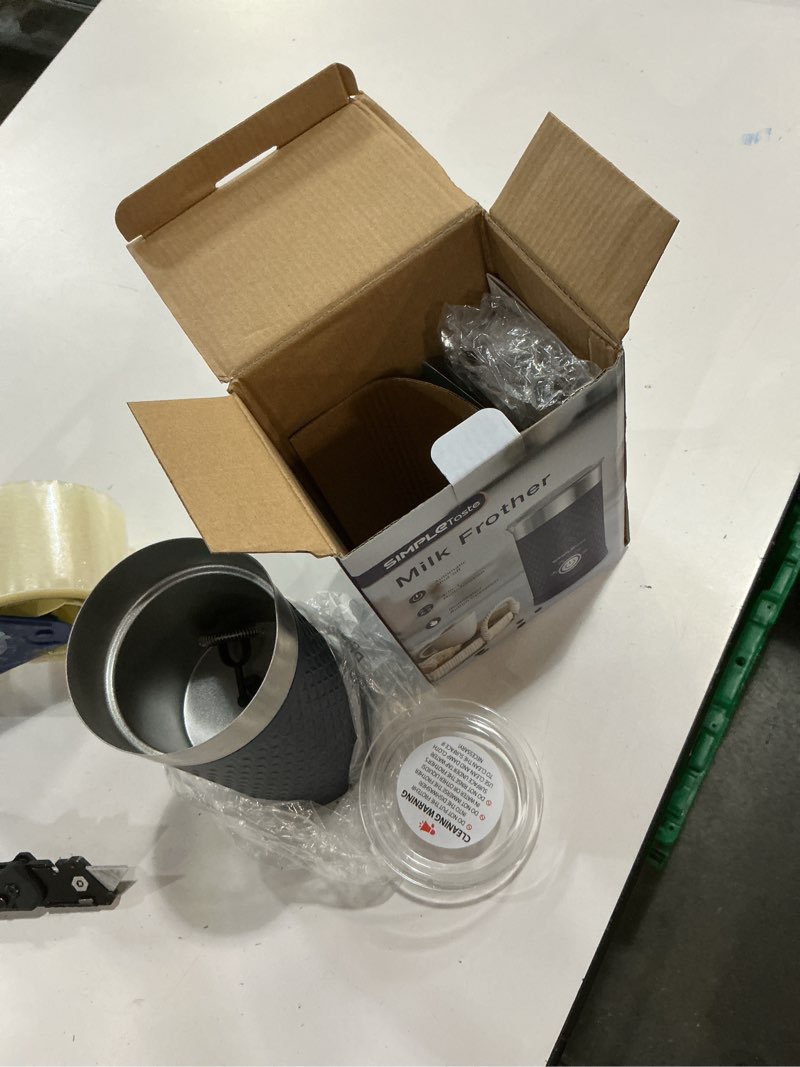 Condition photo showing As Is for simpletaste milk frother, 4-in-1 electric milk steamer, automatic warm and cold foam maker and milk warmer for latte, cappuccinos, macchiato blue