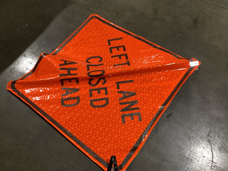 Condition photo showing Good Condition for 48" x 48" High Intensity Reflective Vinyl Roll-Up MUTCD Compliant Traffic Control Sign (Left Lane Closed Ahead)