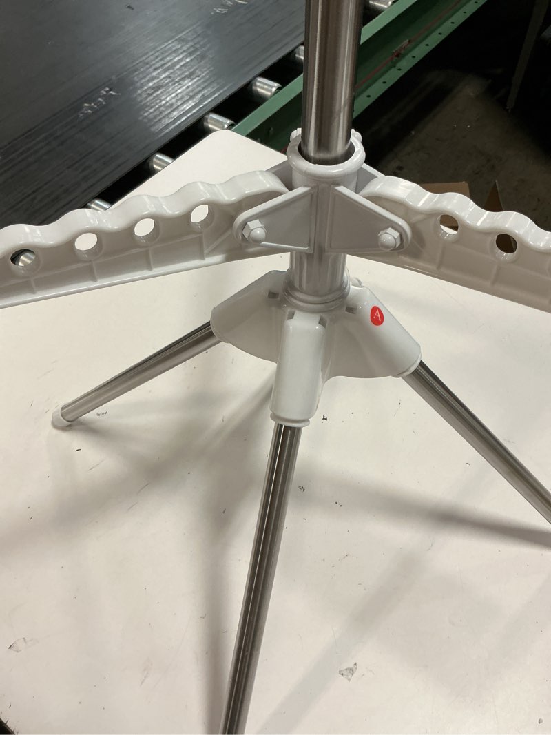 Condition photo showing As Is for abiglifty rotatable and foldable clothes drying rack, space saving free standing laundry drying rack for indoor, balcony, 2 layer 2 tier