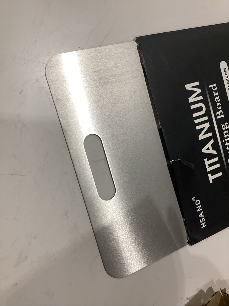 Condition photo showing Good Condition for titanium cutting board