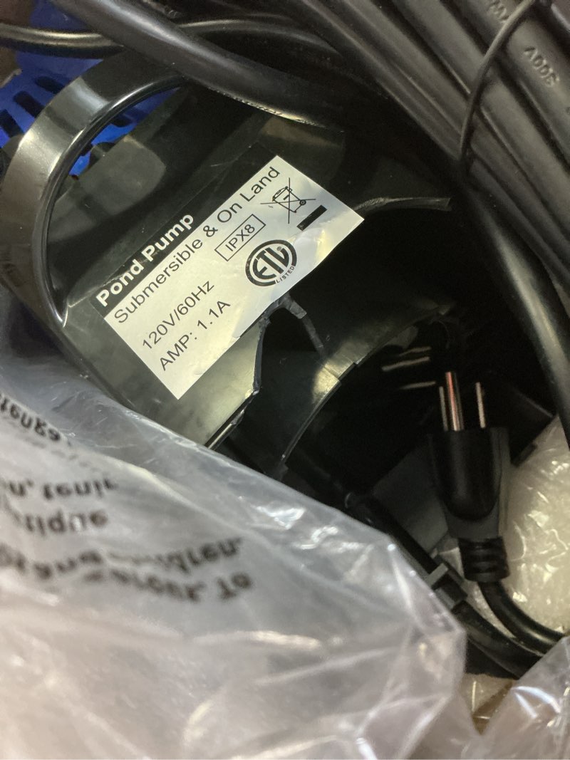 Condition photo showing As Is for 3200gph pond pump, 200w submersible water pump with 33ft power cord & barrier bag, 2 hose adapters, 20ft. lift height for garden ponds, fountains, waterfalls, water circulation (blue)