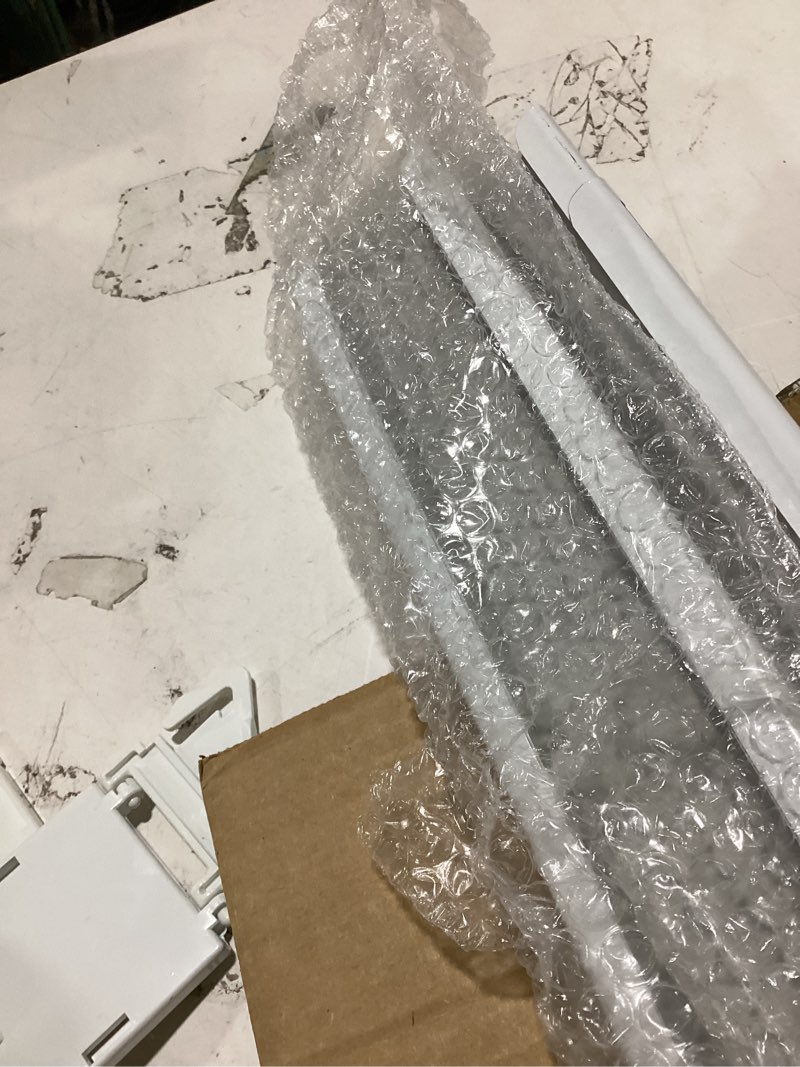Condition photo showing As Is for wide pocket curtain rod 48-84 inch