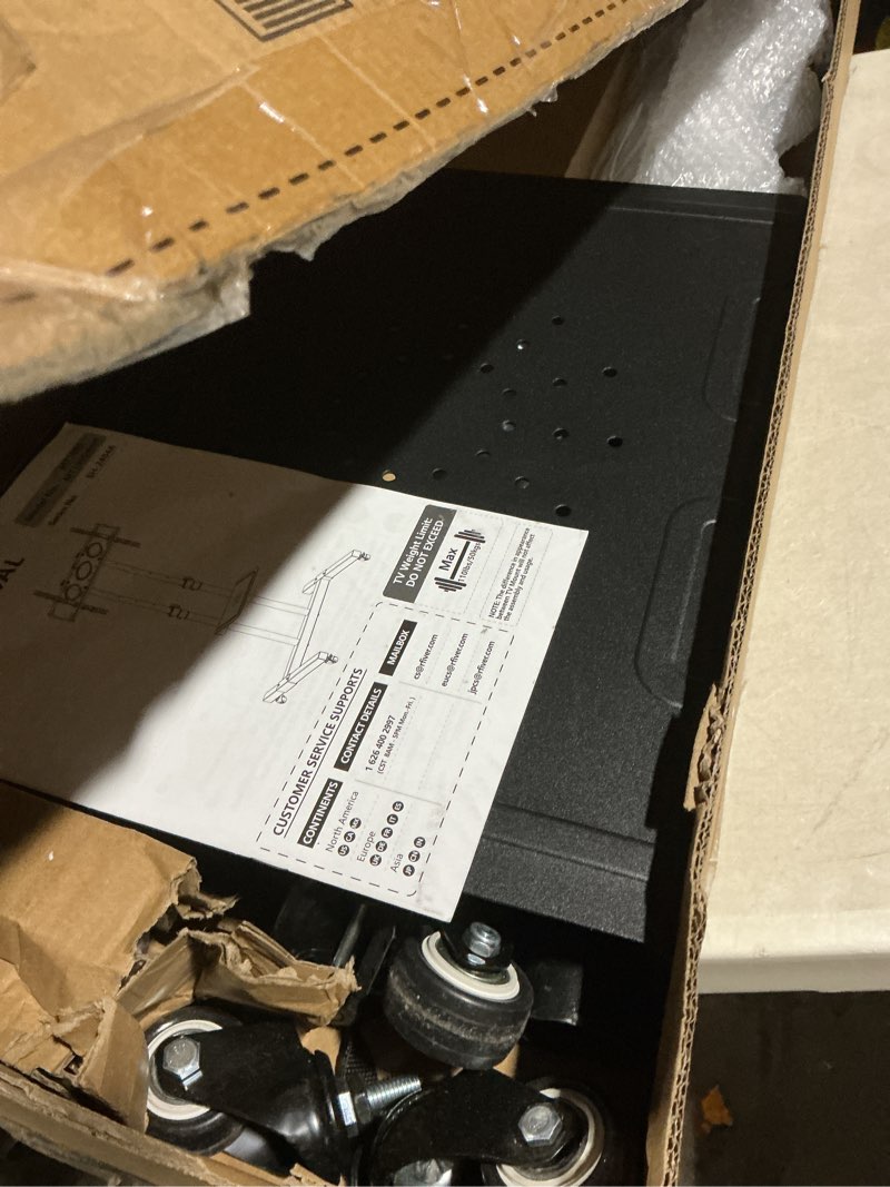 Condition photo showing As Is for TAVR Furniture Mobile TV Stand Rolling TV Cart Floor Stand with Mount on Lockable Wheels Height Adjustable for 32-83 Inch TV Stand Flat Screen or Curved TVs Monitors Display Trolley Loading 110 lbs BLACK WITH 1 SHELF