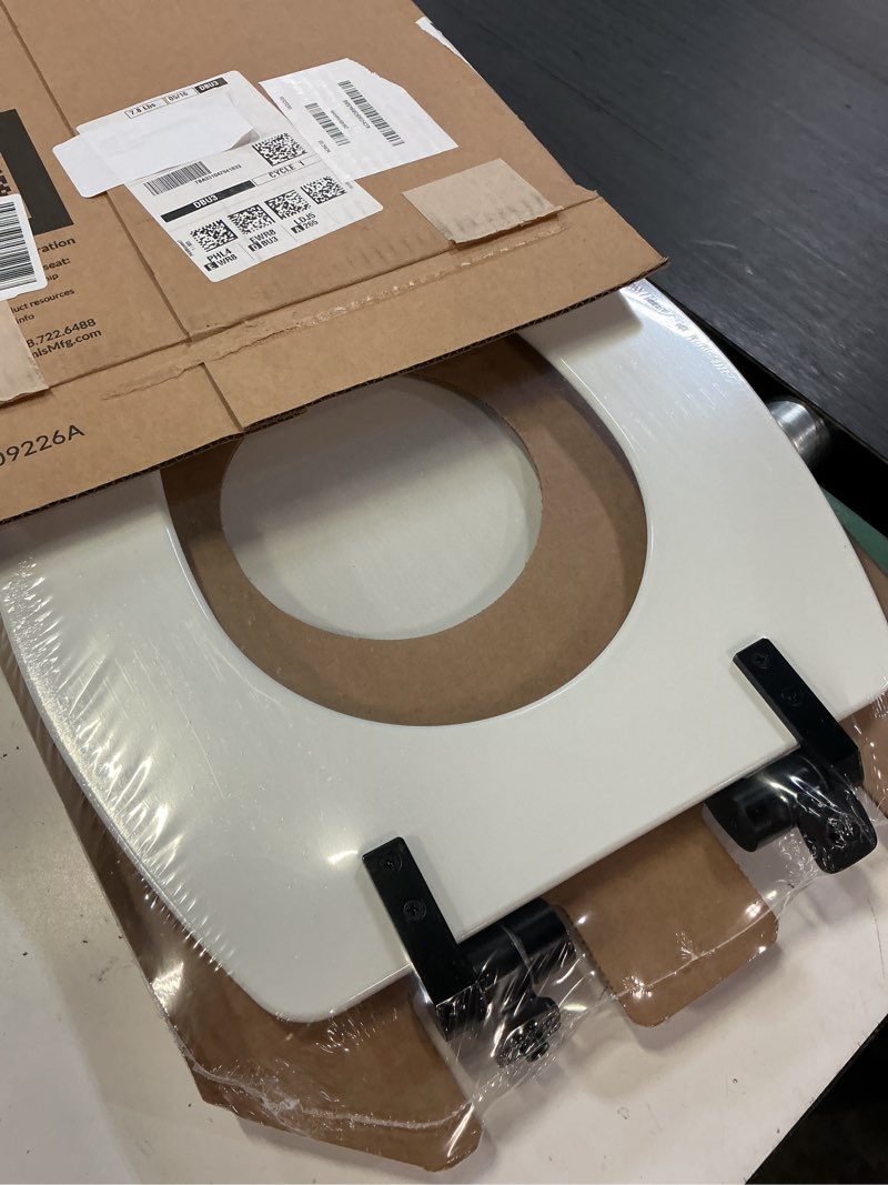 Condition photo showing New/Like New for mayfair benton? elongated enameled wood toilet seat in white with sta-tite? seat fastening system? and whisper•close? matte black metal hinge