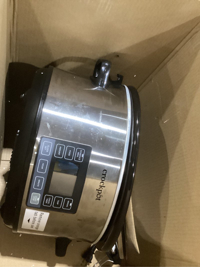 Condition photo showing As Is for crock-pot 7-quart manual slow cooker, family size serves 8+ people & fits 6-lb roast, removable stoneware with warming setting, dishwasher safe for easy cleanup, stainless steel 7-quart stainless steel, similar to stock photo, not tested