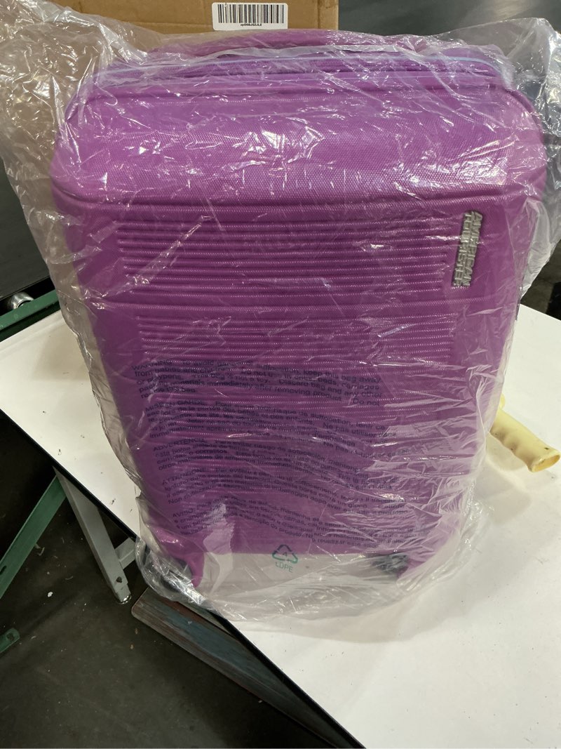 Condition photo showing New/Like New for american tourister stratum 2.0 expandable hardside luggage with spinner wheels, hyper violet, carry-on 20-inch carry-on hyper violet