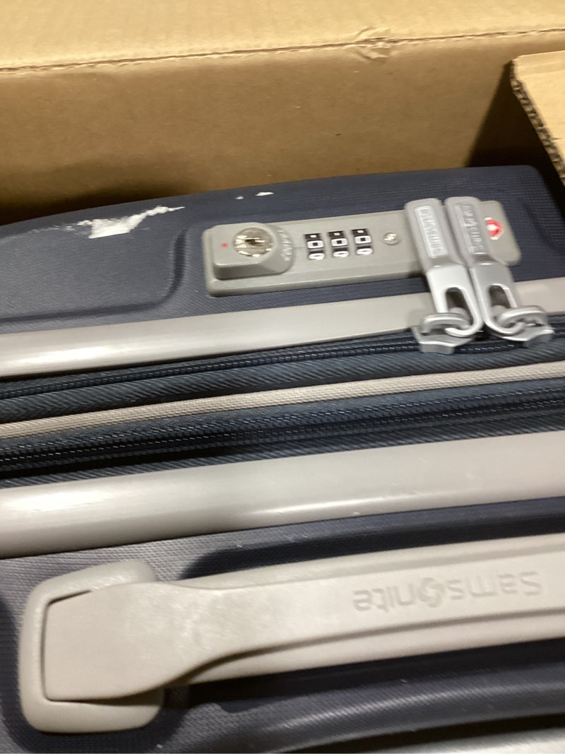 Condition photo showing New/Like New for Samsonite Freeform Hardside Carry-On Luggage with Spinner Wheels - Hardshell Suitcase - TSA, Airline-Approved - Expandable Hard Shell, Smooth Rolling Wheels for Lightweight Travel - Navy Carry-on Spinner Navy