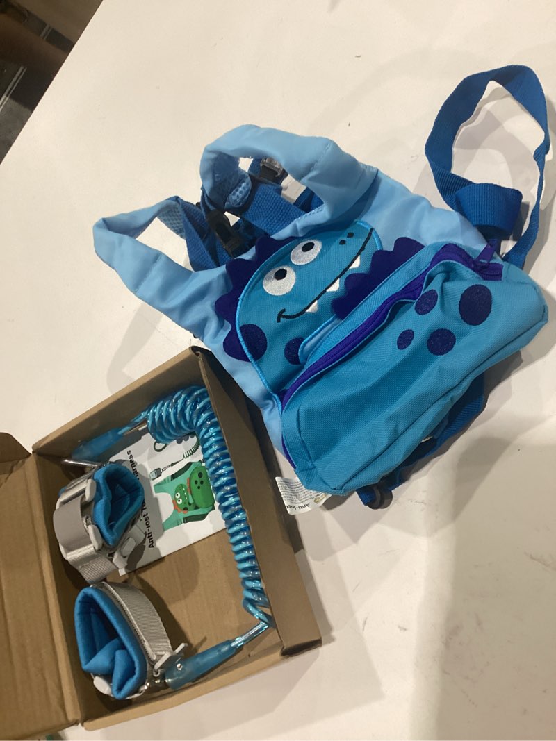 Condition photo showing Good Condition for dr.meter 3 in 1 toddler harness leash + 8.2ft anti lost wrist link, cute dinosaur kids safety harness with key lock, child walking harness assistant strap for outdoor activity travel blue