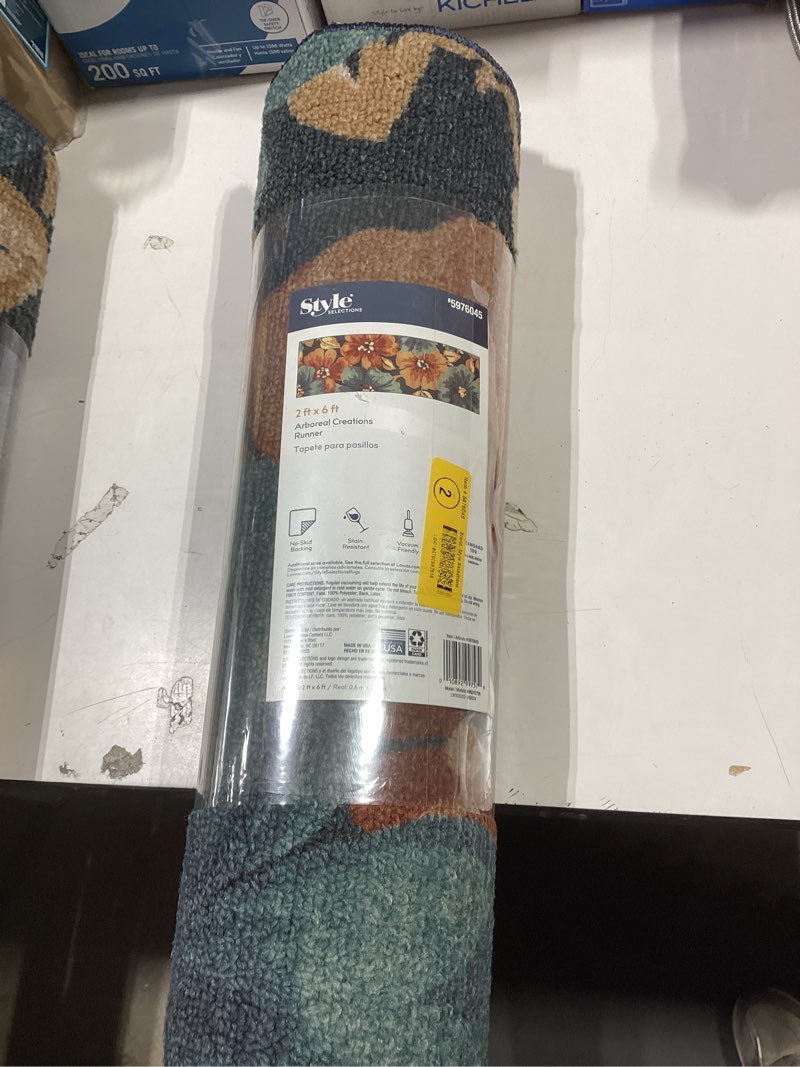 Condition photo showing As Is for Style Selections Arboreal Creations 2 x 6 (ft) Tufted Polyester Blue/Orange/Green Rectangula