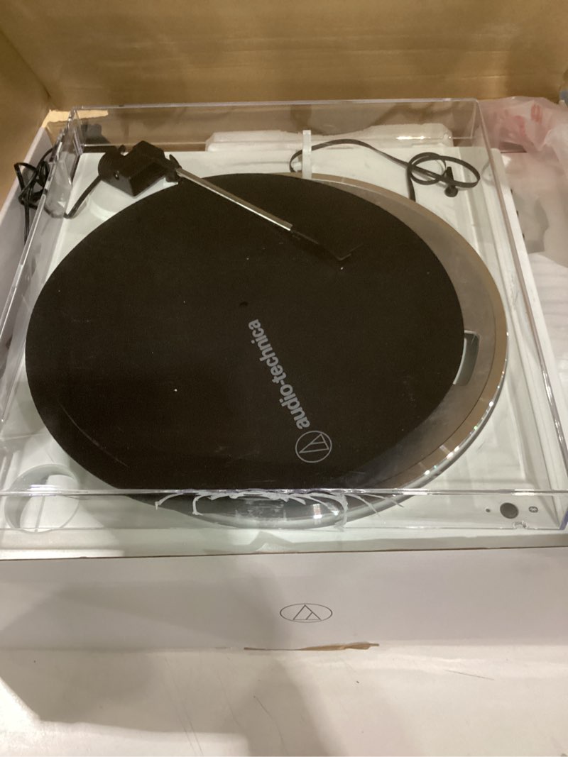 Condition photo showing As Is for damages audio-technica at-lp60xbt-ww automatic turntable white