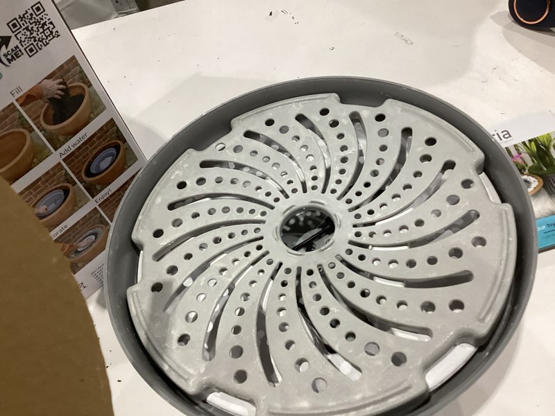 Condition photo showing As Is for hydria 5.3-in h plastic water planter outdoor fountain pump included