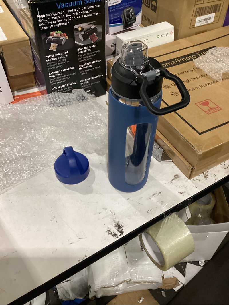 Condition photo showing New/Like New for kodrine 24oz glass water bottle with straw and 2 lids, blue | reusable daily water intake, with measurements, silicone sleeve, time marker, cupholder friendly for home,gym,sports blue 24 ounces