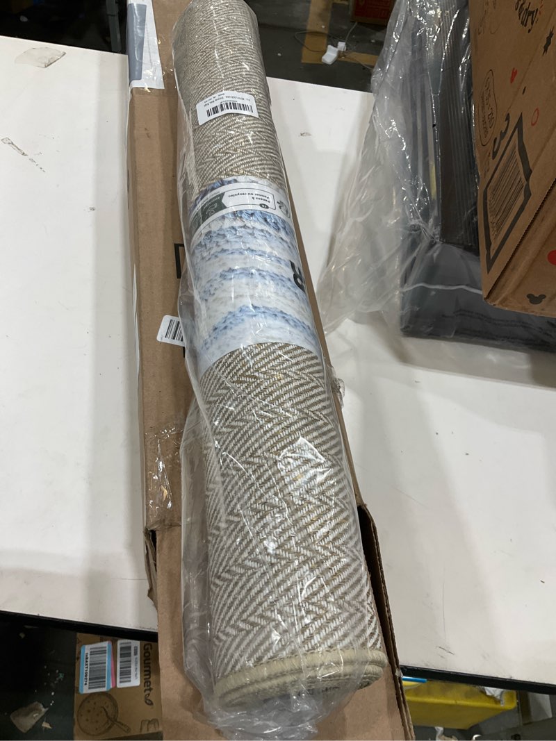 Condition photo showing item condition for Ultra Thin Door Mat Indoor Entrance 24"x47", Low-Profile Indoor Door Mat, Non Slip Entry Mat Rubber Backing Unique Herringbone Design Inside Doormat Dirt Trapper Entryway Mats, Beige 24"x47" Khaki