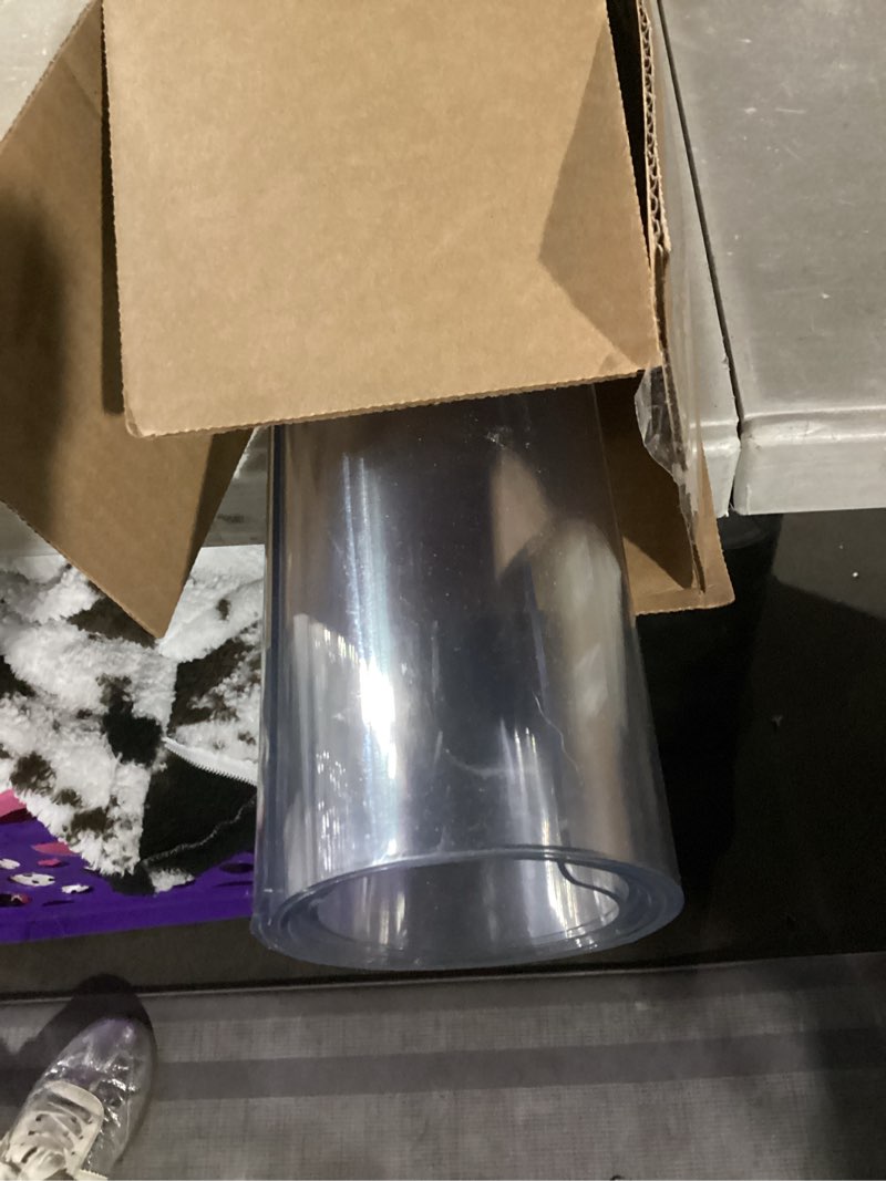 Condition photo showing Good Condition for Warmstar Clear Table Protector 2mm Thick, 28 x 52 Inch Clear Table Cover Protector, Plastic Table Cover, Clear Desk Mat Desk Pad, Desk Protector Mat for Coffee Table, Writing Desk, Dining Room 28" x 52"