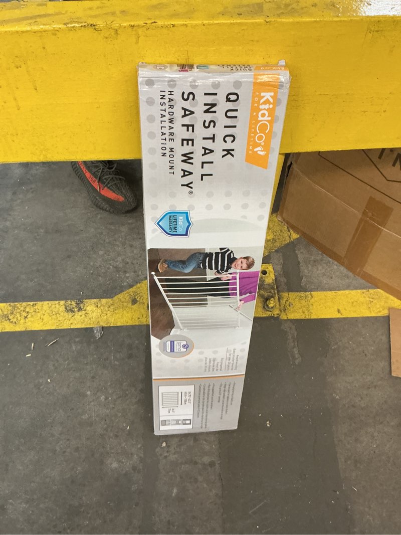 Condition photo showing New/Like New for kidco quick install safeway top of stairs quick release baby gate for blocking stairs or hallways and dividing rooms, 42.5 x 28.75 inches, steel, white