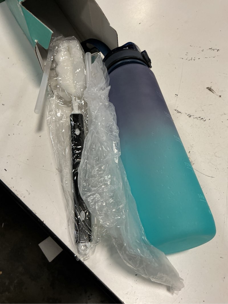 Condition photo showing Good Condition for swigina [2-in-1 lid] insulated water bottle with silicone boot (36hrs cold/18hrs hot) - diy stickers, leakproof, bpa free, 40 oz cyan black 40 ounces