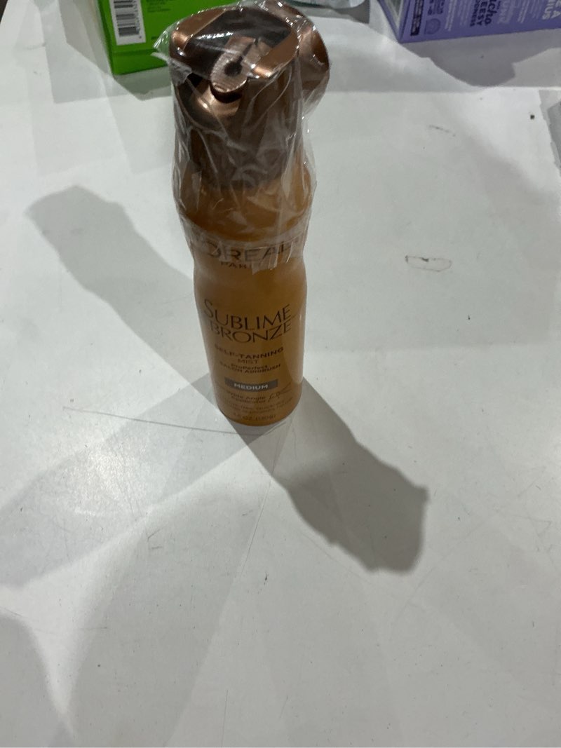 Condition photo showing New/Like New for l'oreal paris sublime bronze self-tanning mist medium - 4.6 fl oz