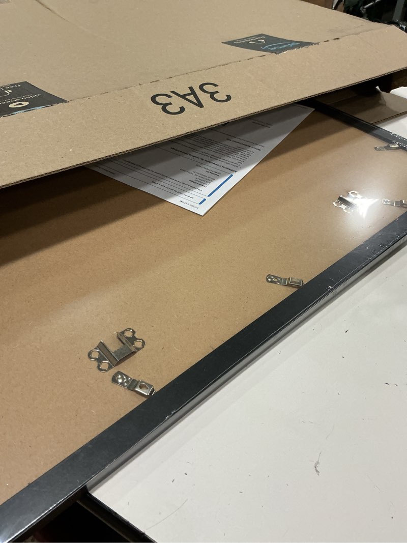 Condition photo showing New/Like New for 17x22 Picture Frame, Classic Black 17 x 22 Poster Frame for Horizontal or Vertical Wall Mounting, 1 Pack Black 17x22