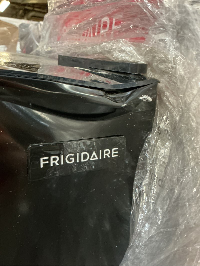 Condition photo showing As Is for Frigidaire 10 Cu. ft. Frost Free Top Mount Refrigerator, Black Efr1033