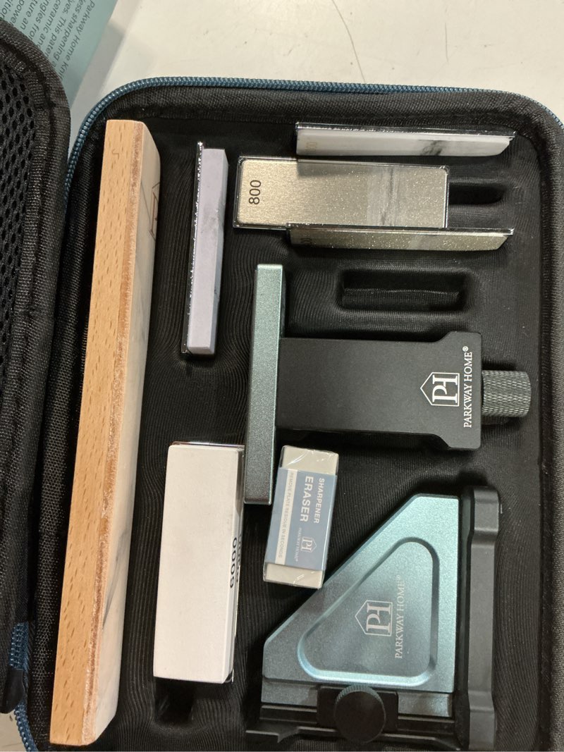 Condition photo showing New/Like New for patented original adjustable rolling knife sharpener kit: adjustable height, 30 angle options, 5 removeable whetstone plates, leather strop with travel case - kitchen knife sharpener sharpener & 5 whetstone plates & leather strop