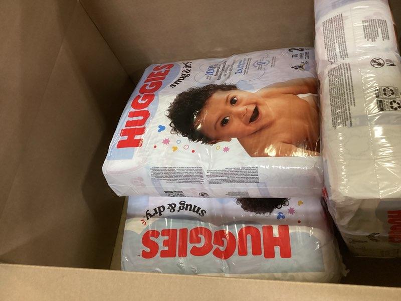 Condition photo showing New/Like New for 3 pack huggies size 2 diapers, snug & dry baby diapers, size 2 (12-18 lbs), 116 count, packaging may vary size 2 116