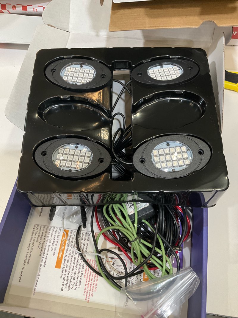 Condition photo showing As Is for 4 Pods RGB LED Rock Lights, Underglow Multicolor Neon Light Kit, Wheel Well Light with APP Control & Music Mode, Under Glow Lights for Trucks,Jeep,SUV,Golf Cart,ATV,Pickup Off Road,12V 4 Pods Brake