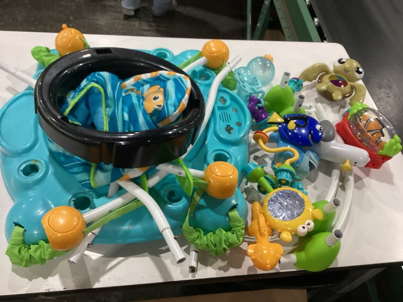 Condition photo showing As Is for bright starts disney baby finding nemo sea of activities baby activity center jumper with interactive toys, lights, songs & sounds, 6-12 months (blue)