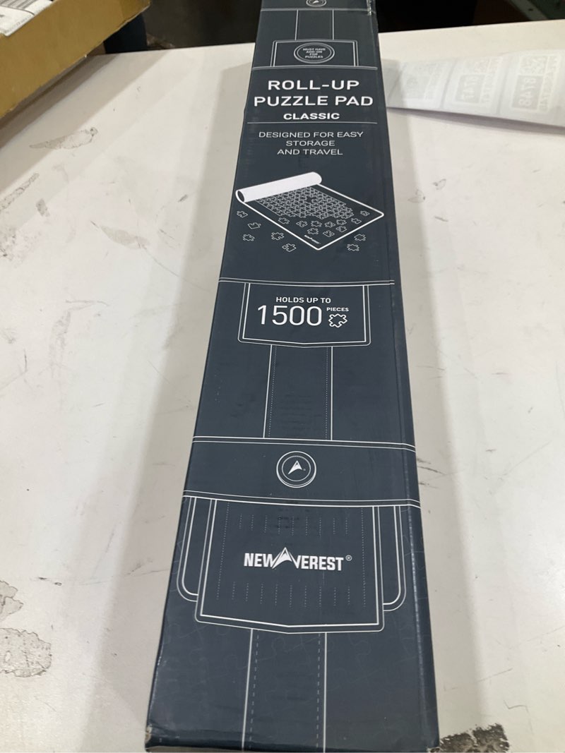 Condition photo showing New/Like New for The Original Newverest Jigsaw Puzzle Mat Roll Up, Saver Pad 46” x 26” Portable Keeper Up to 1500 Pieces with Non-Slip Rubber Bottom & Smooth Top + 3 Puzzle Sorting Trays & Travel-Friendly Storage Bag 1500pcs