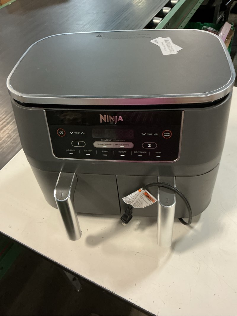 Condition photo showing As Is for ninja dz201 foodi 8 quart 6-in-1 dualzone 2-basket air fryer with 2 independent frying baskets, match cook & smart finish to roast, broil, dehydrate & more for quick, easy meals, grey 8-qt & dualzone