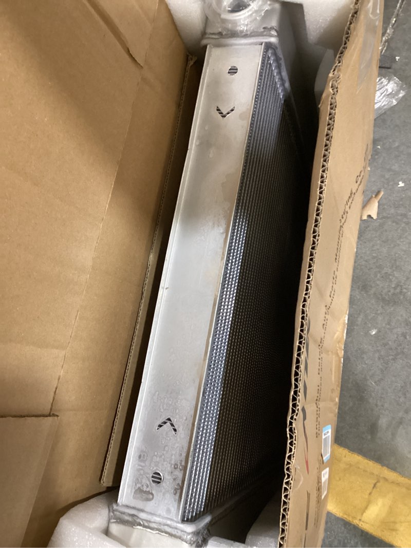 Condition photo showing As Is for zap 3-row full aluminum radiator compatible with 2004-2009 05 06 07 08 dodge ram 1500/2500/3500 5.7l 5.9l v8 radiator