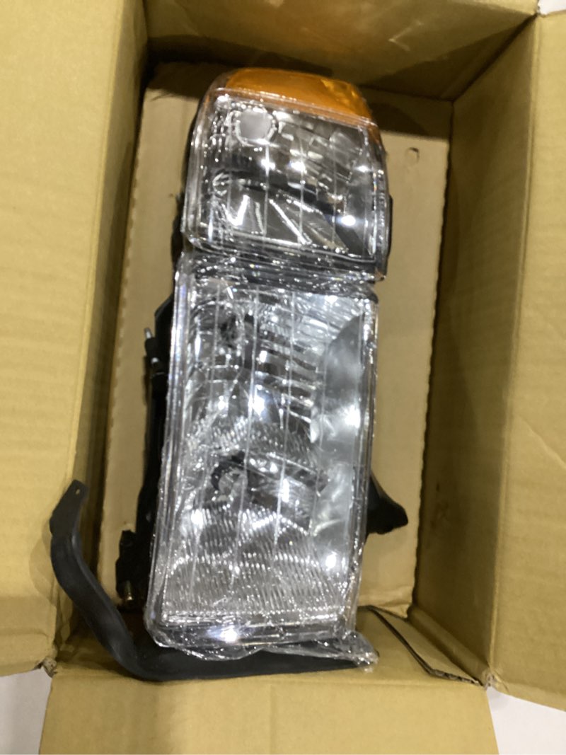 Condition photo showing As Is for Dorman 1590468 Driver Side Headlight Assembly Compatible with Select Dodge Models