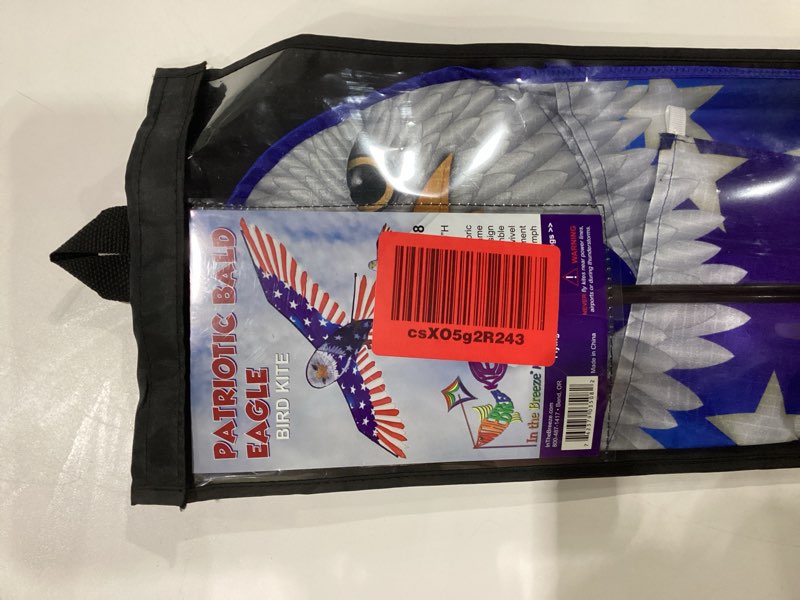 Condition photo showing New/Like New for In the Breeze 3508 — 70-inch Patriotic Bald Eagle Kite — Printed Bird of Prey Kite with Flag Overlay