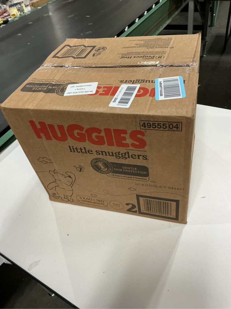 Condition photo showing New/Like New for Huggies Size 2 Diapers, Little Snugglers Baby Diapers, Size 2 (12-18 lbs), 180 Ct (3 Packs of 60), Packaging May Vary Size 2 180