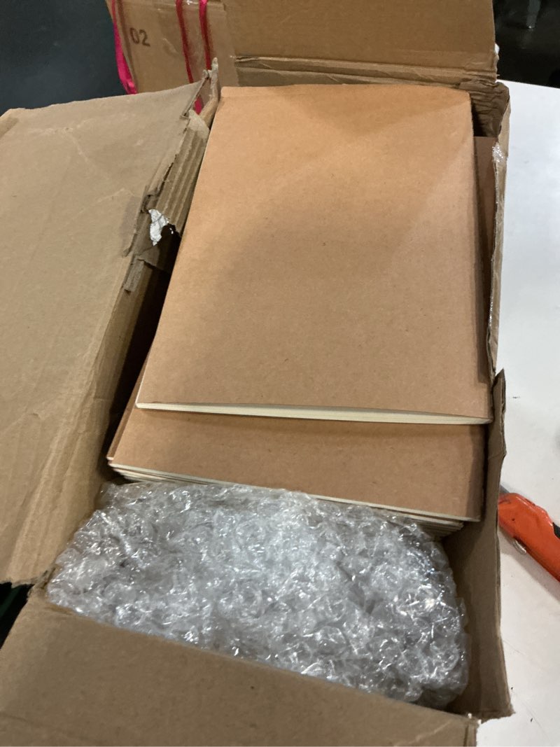 Condition photo showing Good Condition for 100 pack kraft notebook journals 5.5 inch x 8.3 inch a5 journal softcover notebooks bulk for kids student writing sketch travel journal office notepad with 60 pages 30 sheets (unlined, brown)