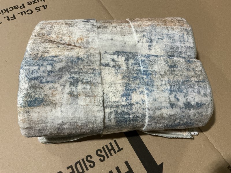 Condition photo showing Good Condition for iohouze abstract area rugs 9x12 ft washable large rugs for living room, non slip dining room rug, printed faux wool rugs for bedroom, floor carpet for office nursery playroom, blue rust 9' x 12' (rectangular) blue/rust/white