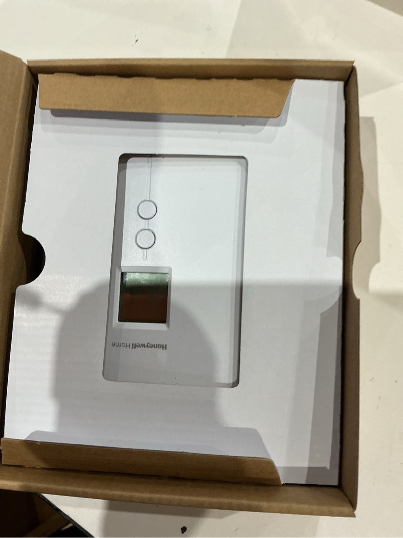 Condition photo showing As Is for honeywell home rlv3120a1005 digital non-programmable thermostat for electric heat only