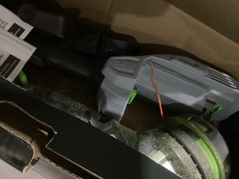 Condition photo showing As Is for ego powerload 56-volt 15-in telescopic shaft battery string trimmer 2.5 ah (battery and charger included)