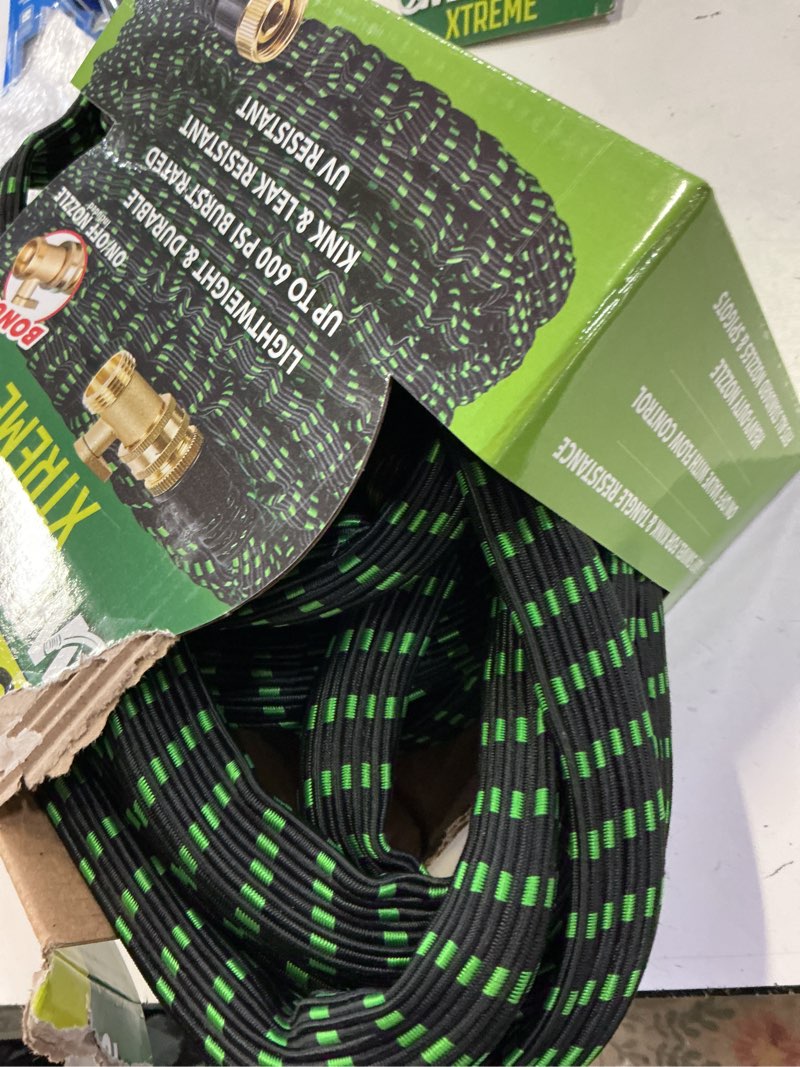 Condition photo showing As Is for flex-able hose flex-able xtreme hose 50ft - kink free, expandable, heavy duty, green garden hose