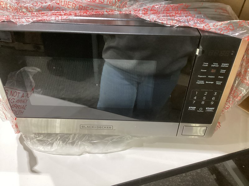 Condition photo showing As Is for BLACK+DECKER Digital Microwave Oven with Turntable Push-Button Door, Child Safety Lock, Stainless Steel, 0.9 Cu Ft 0.9 Cu.Ft, AS IS, NOT TESTED