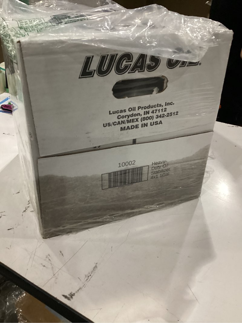 Condition photo showing As Is for damaged lucas oil 10002 heavy duty oil stabilizer - 1 gallon (pack of 4)