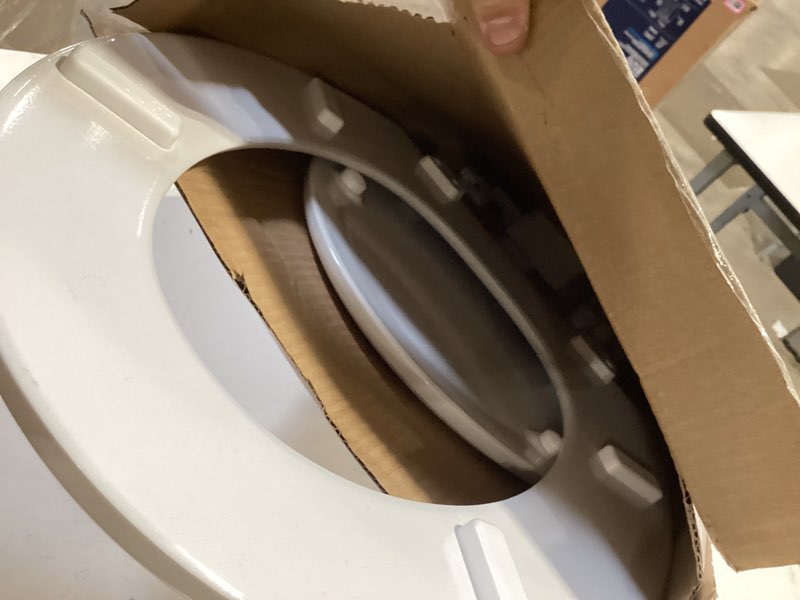 Condition photo showing As Is for american standard bedminster wood white elongated soft close toilet seat