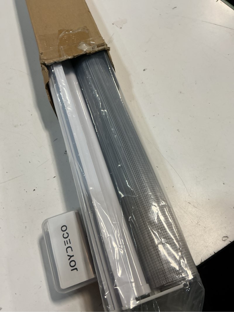 Condition photo showing New/Like New for joydeco cordless zebra blinds for windows, dual layer free-stop zebra shades privacy light control for day and night, light filtering sheer blinds for indoor windows (grey, 36" w x 75" h) grey 36" w x 75" h ready made
